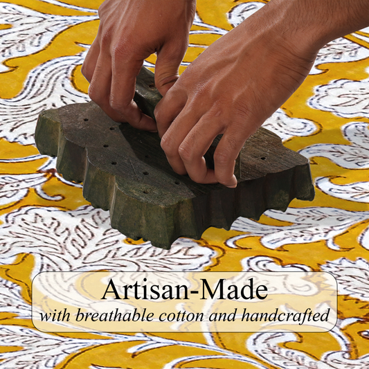 Hands using a stamp on fabric with 'Artisan-Made' text overlay