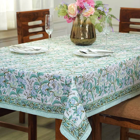 Tablecloth with floral pattern on a set dining table