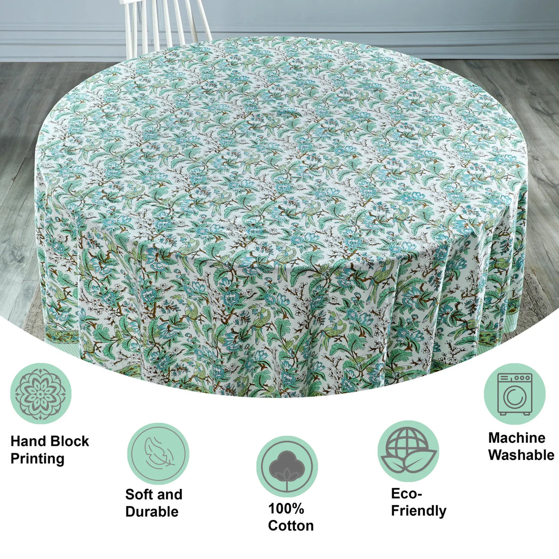 Floral patterned tablecloth on a round table with certification icons at the bottom.