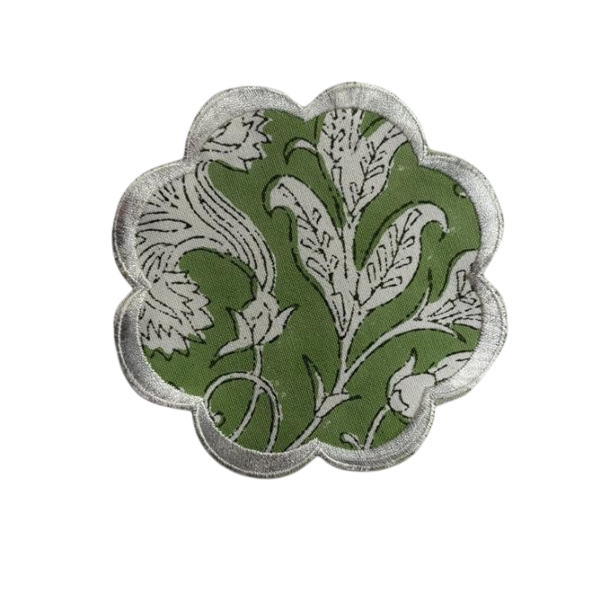 Decorative patch with green and white floral design on a white background