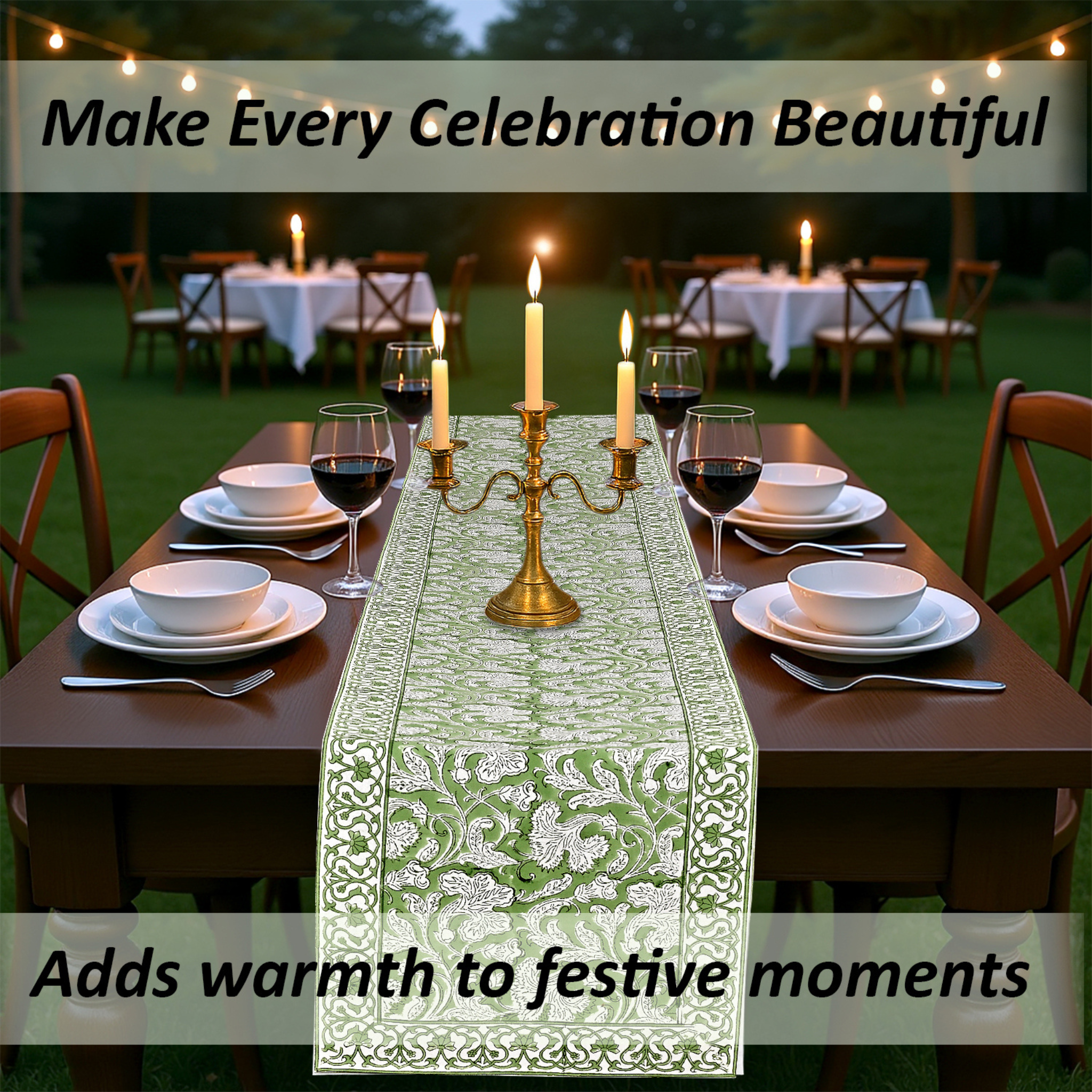 Dining table set for a celebration with a green patterned table runner, candles, and wine glasses.