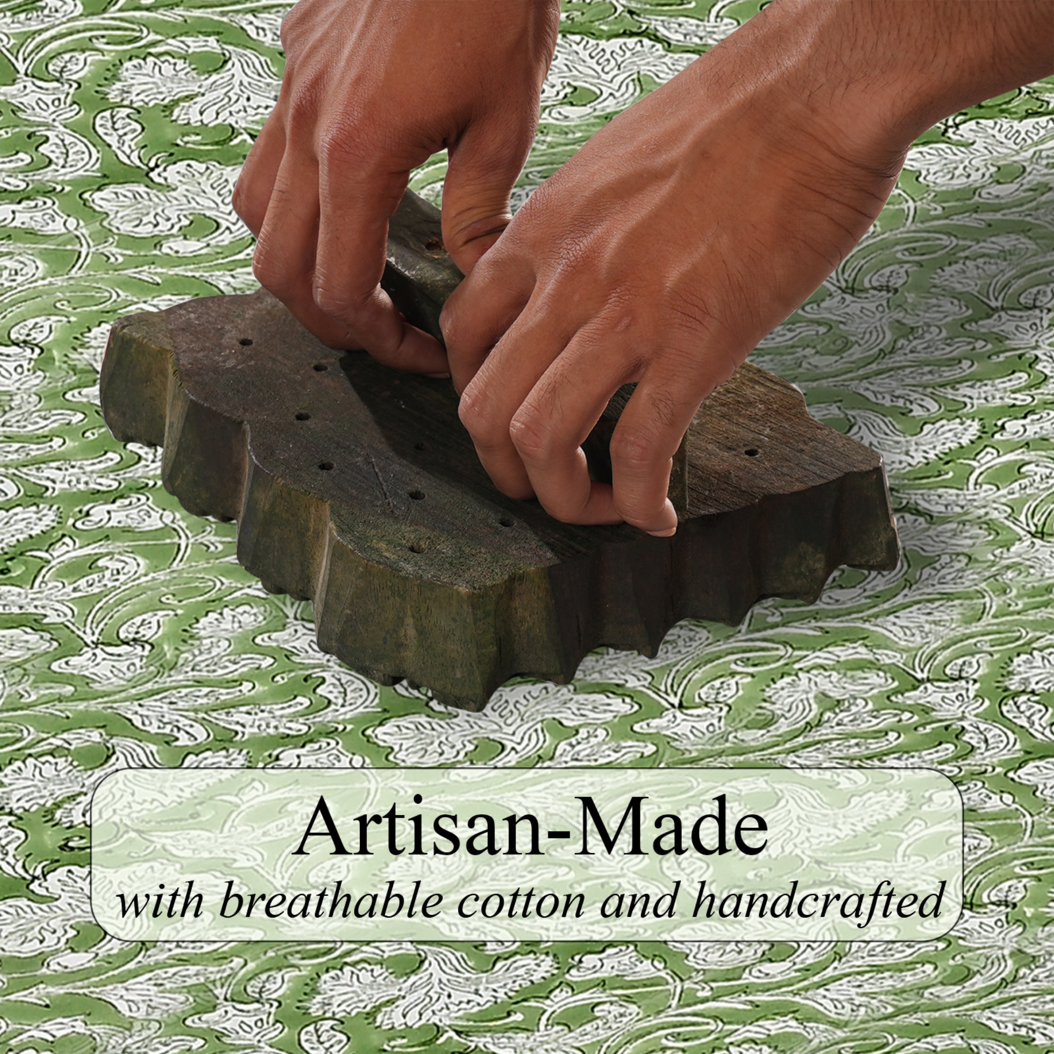 Hands using a wooden block printing tool on fabric with 'Artisan-Made' text overlay.