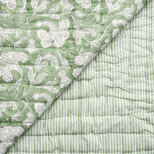 Two green textured fabrics with different patterns on a white background