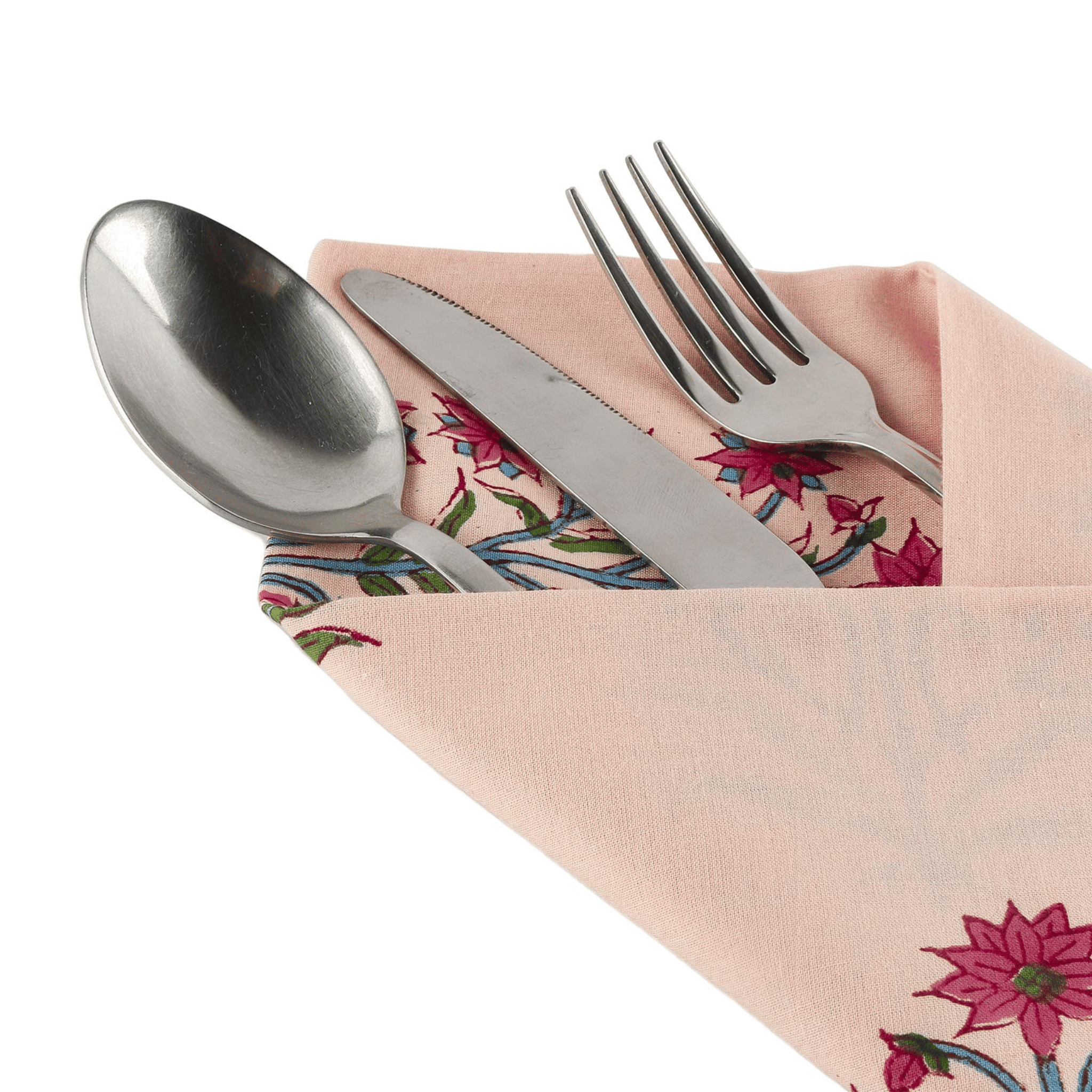 Silver spoon, knife, and fork on a floral-patterned pink napkin