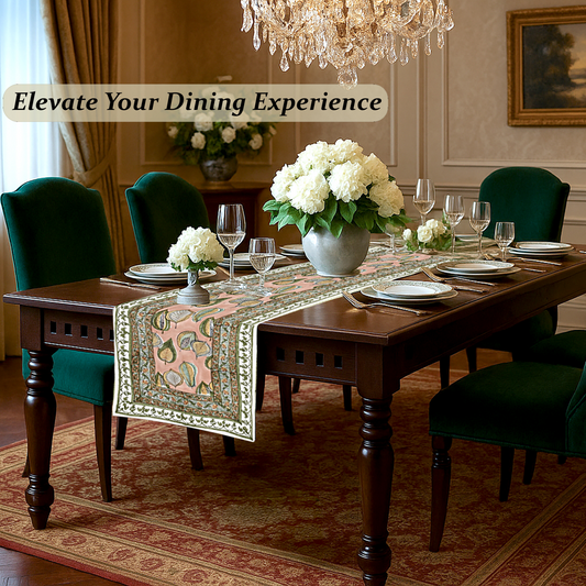 Dining room with a table set for dinner, flowers, and a chandelier.