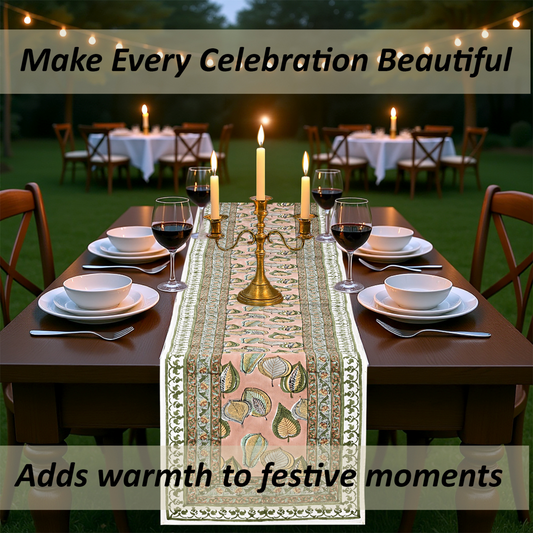 Dining table set for a celebration with a decorative table runner, candles, and wine glasses.