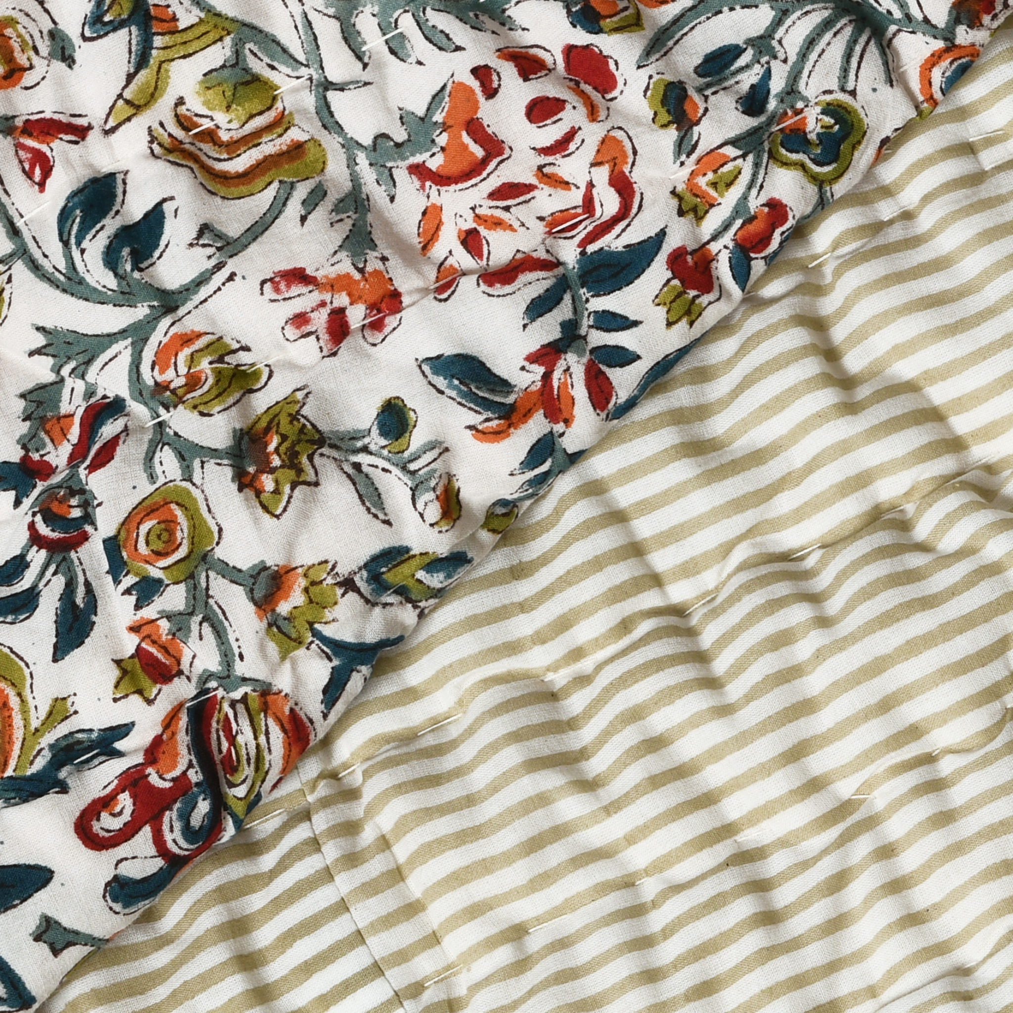 Floral-patterned fabric and striped fabric together
