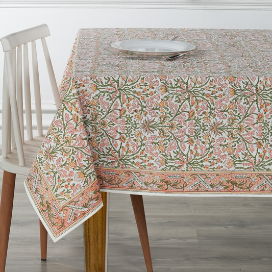 Tablecloth with floral pattern on a wooden table