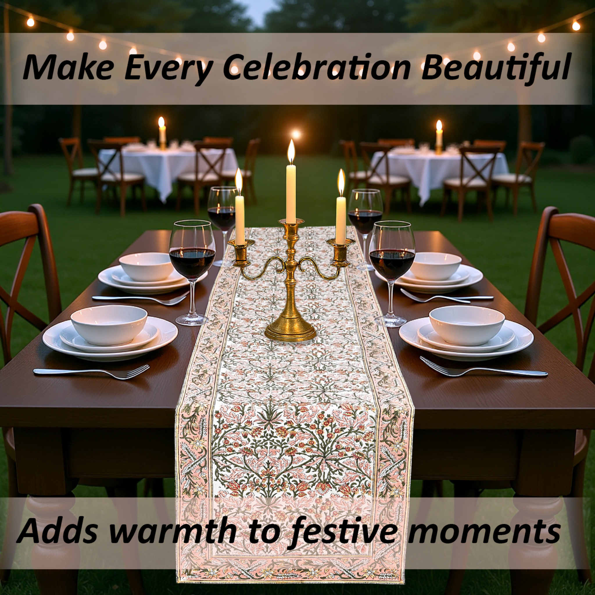 Dining table set for a celebration with a decorative table runner, candles, and wine glasses.