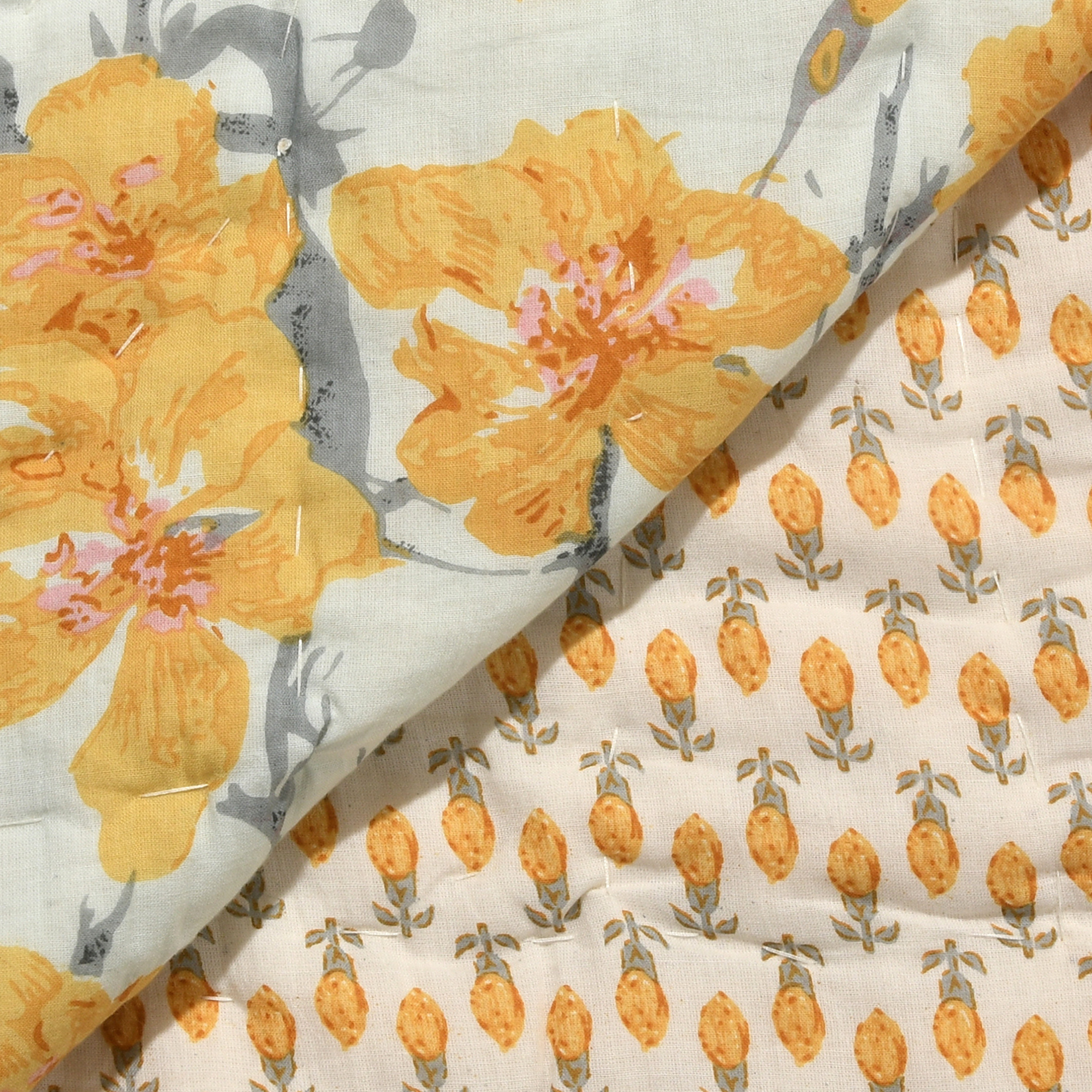 Floral fabric with yellow flowers on a white background