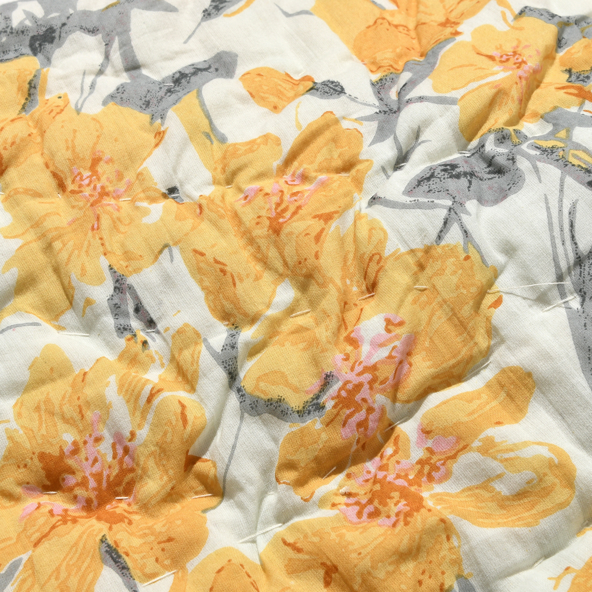 Pattern of yellow flowers on a white background with gray accents
