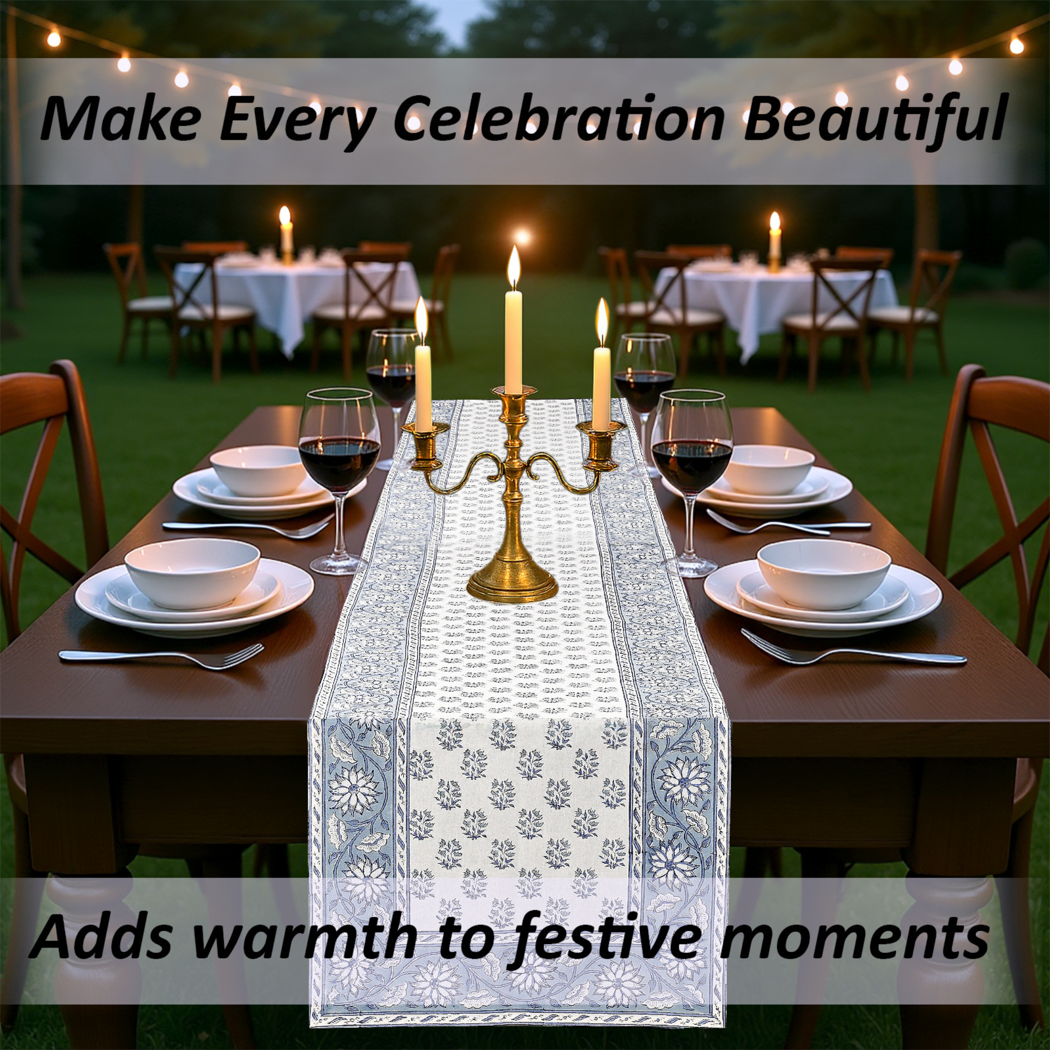 Dining table set with candles, glasses, and a decorative table runner in an outdoor setting.