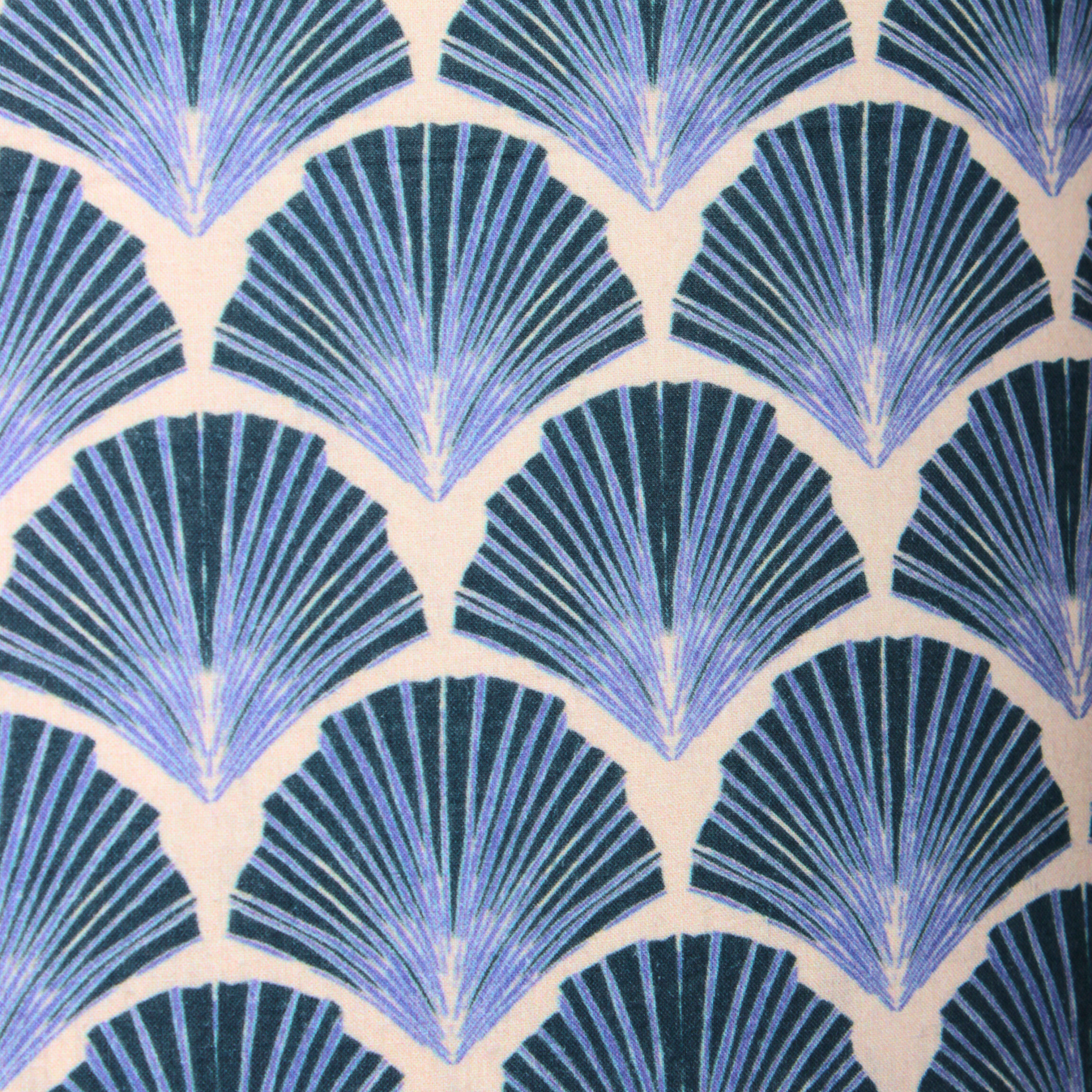 Pattern of blue and green fan shapes on a beige background