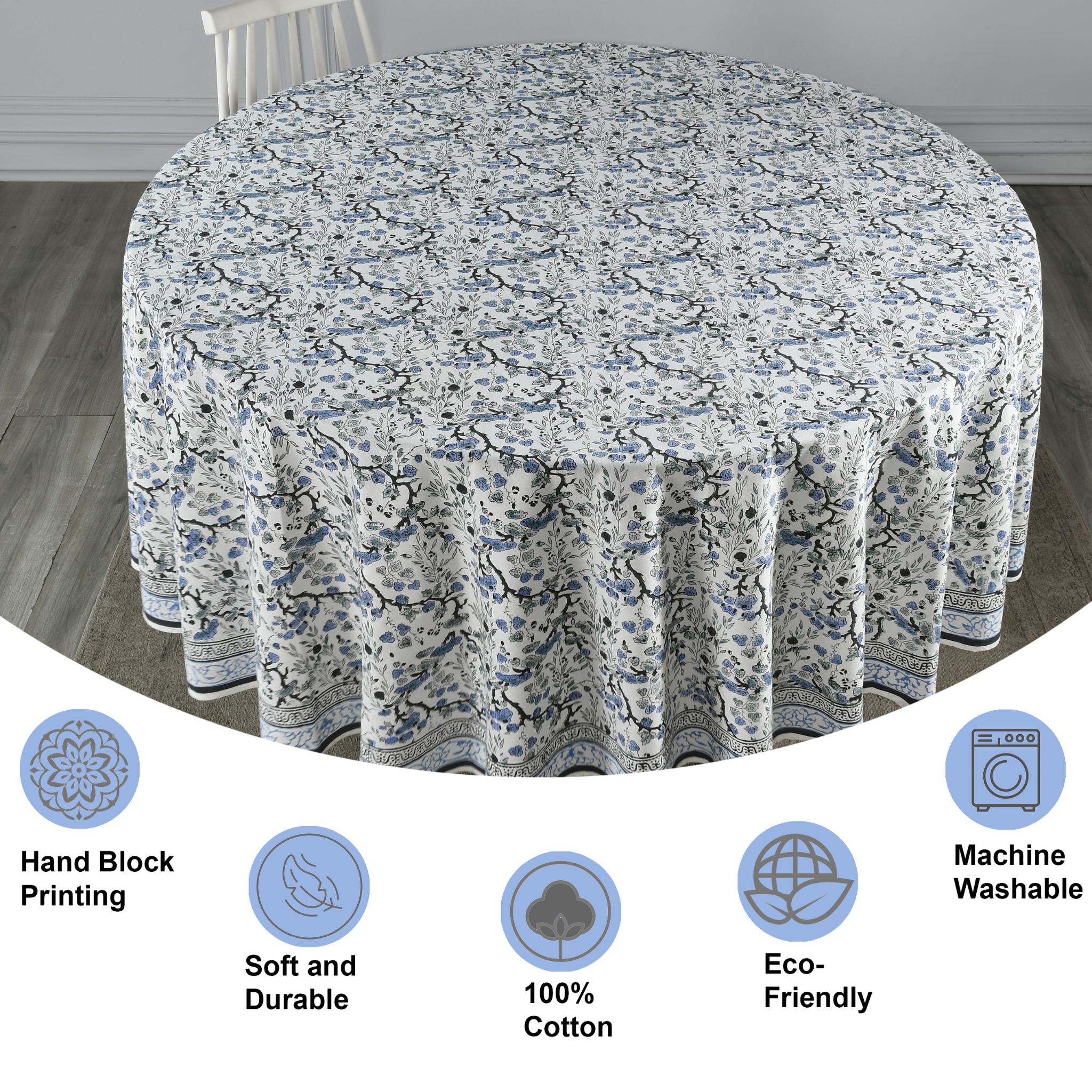Floral patterned tablecloth on a round table with features highlighted.