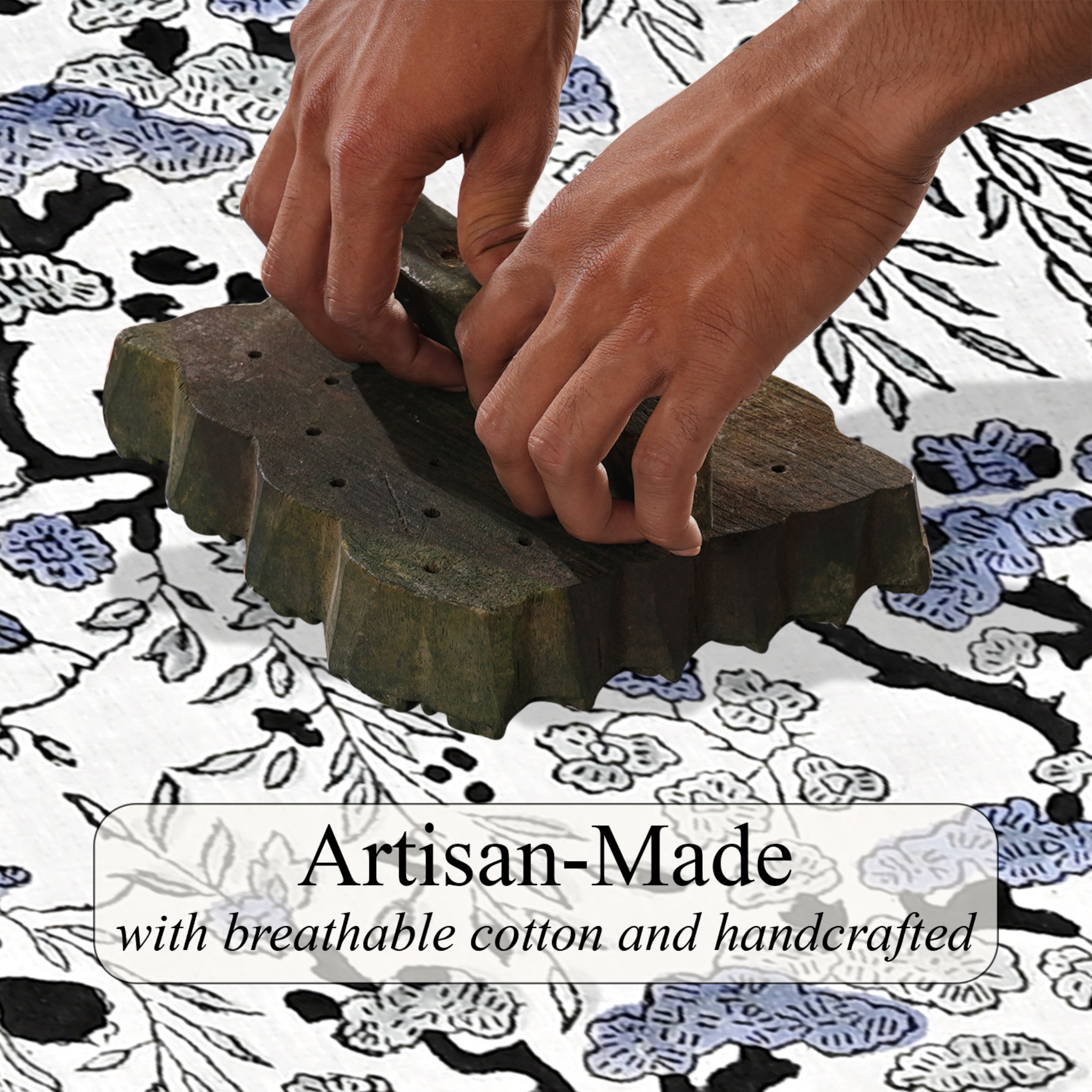 Hands using a traditional textile tool on fabric with floral patterns