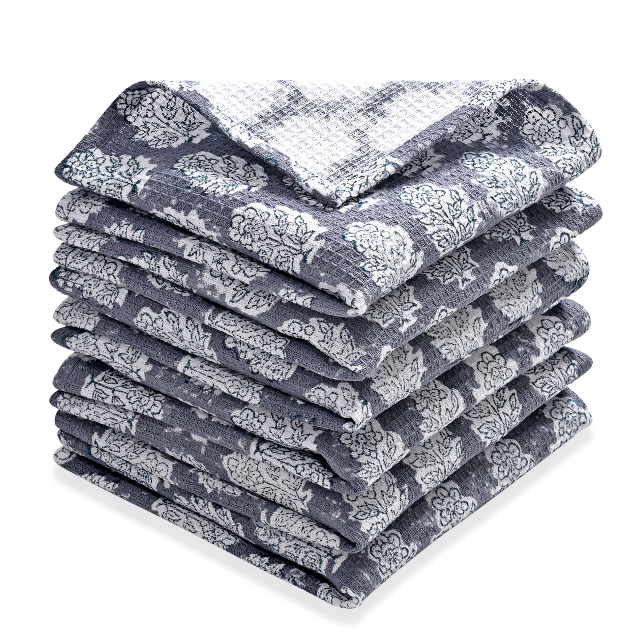 Stack of folded blue and white patterned towels on a white background