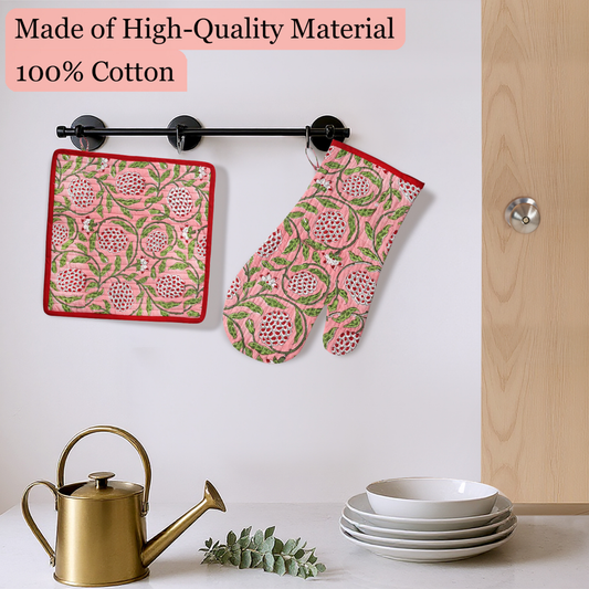 Patterned pot holder and oven mitt hanging on a rack with kitchen items below.