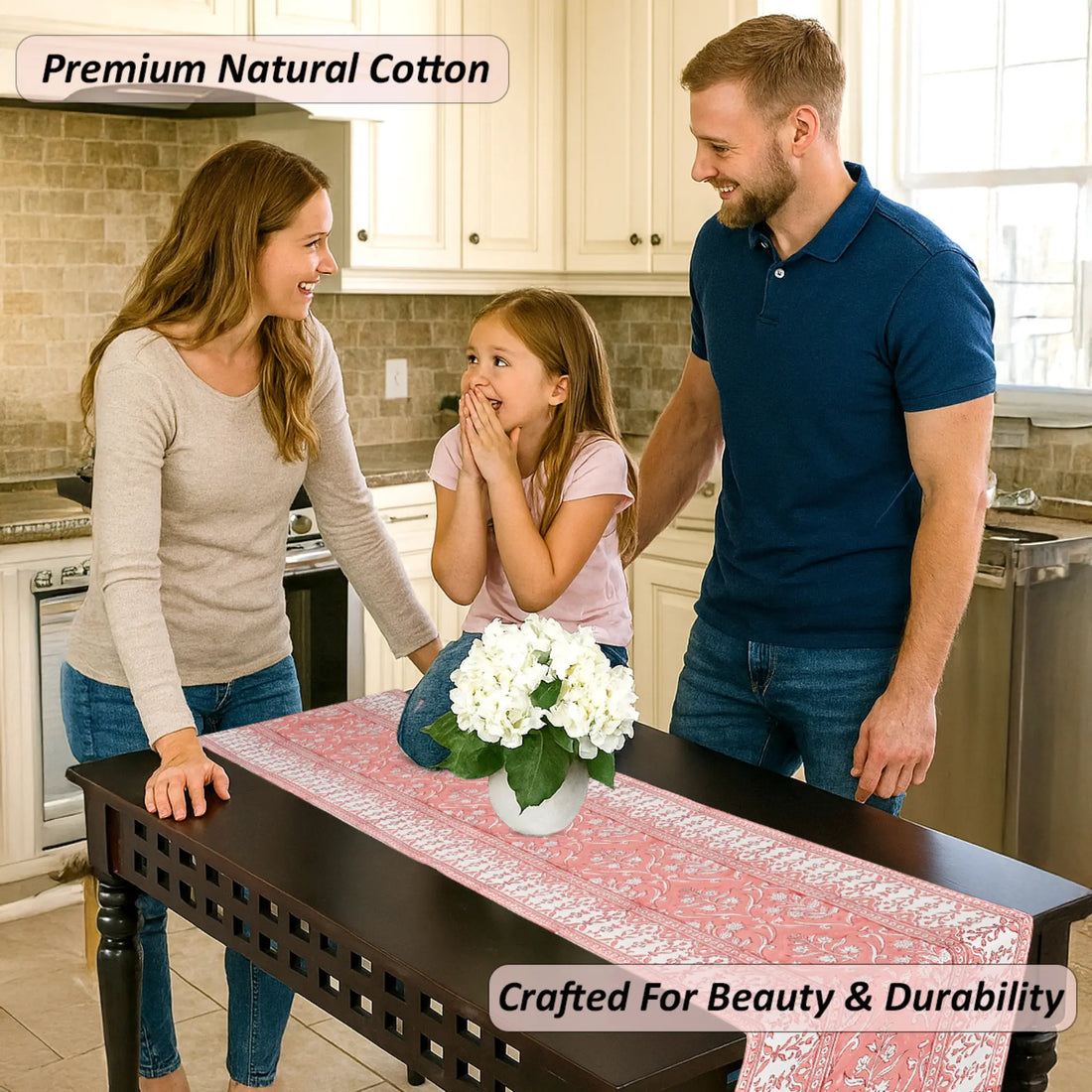 Family in a kitchen with a table runner and flowers, emphasizing premium natural cotton.