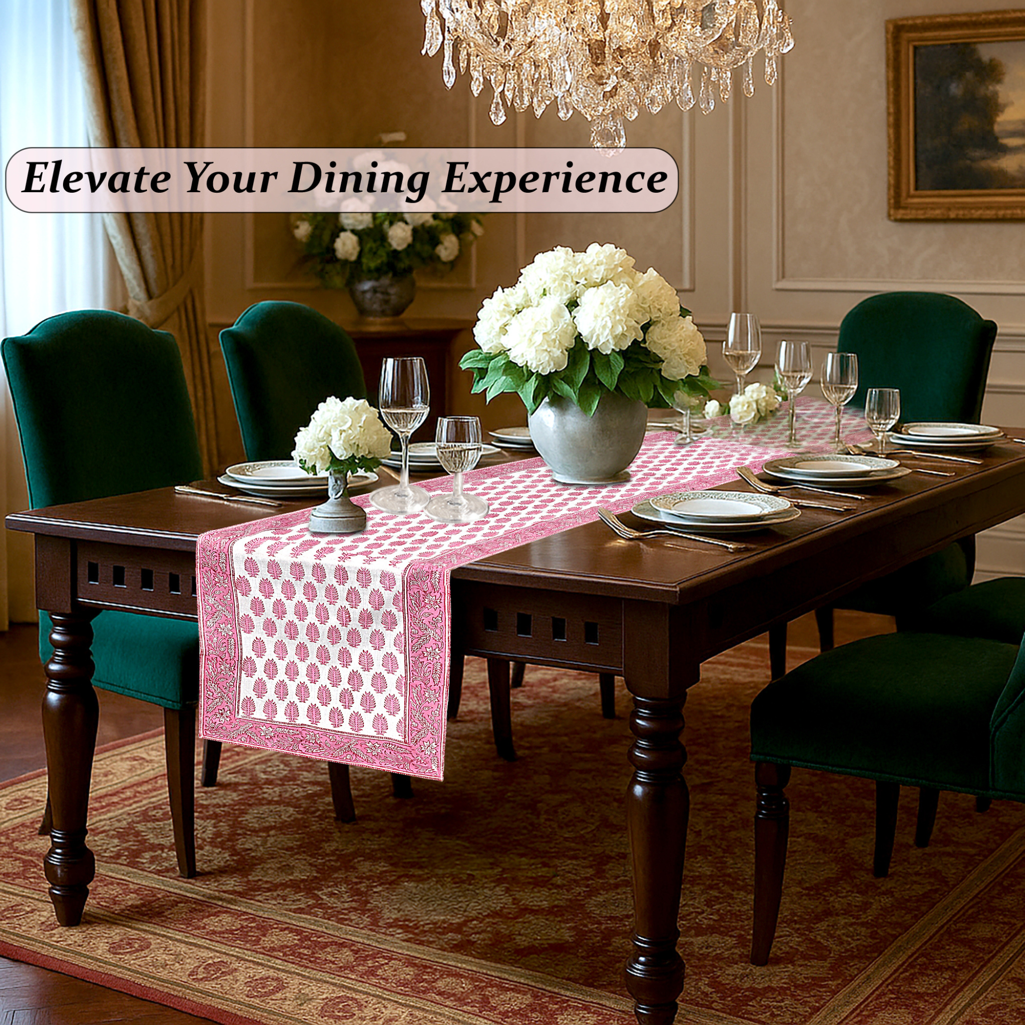 Dining room with a table set for dinner, pink table runner, and white flowers.