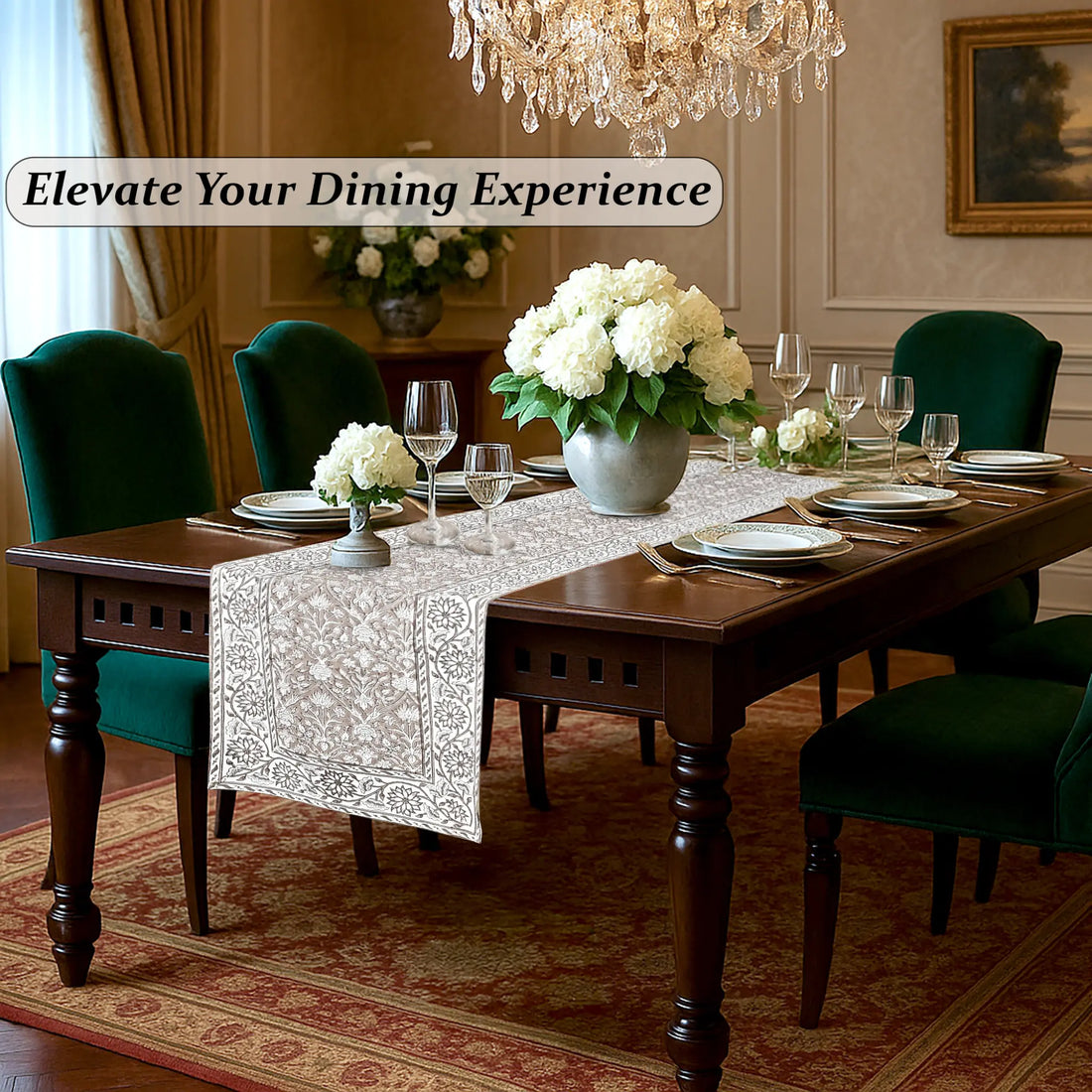 Dining room with a table set for dinner, flowers, and a chandelier.