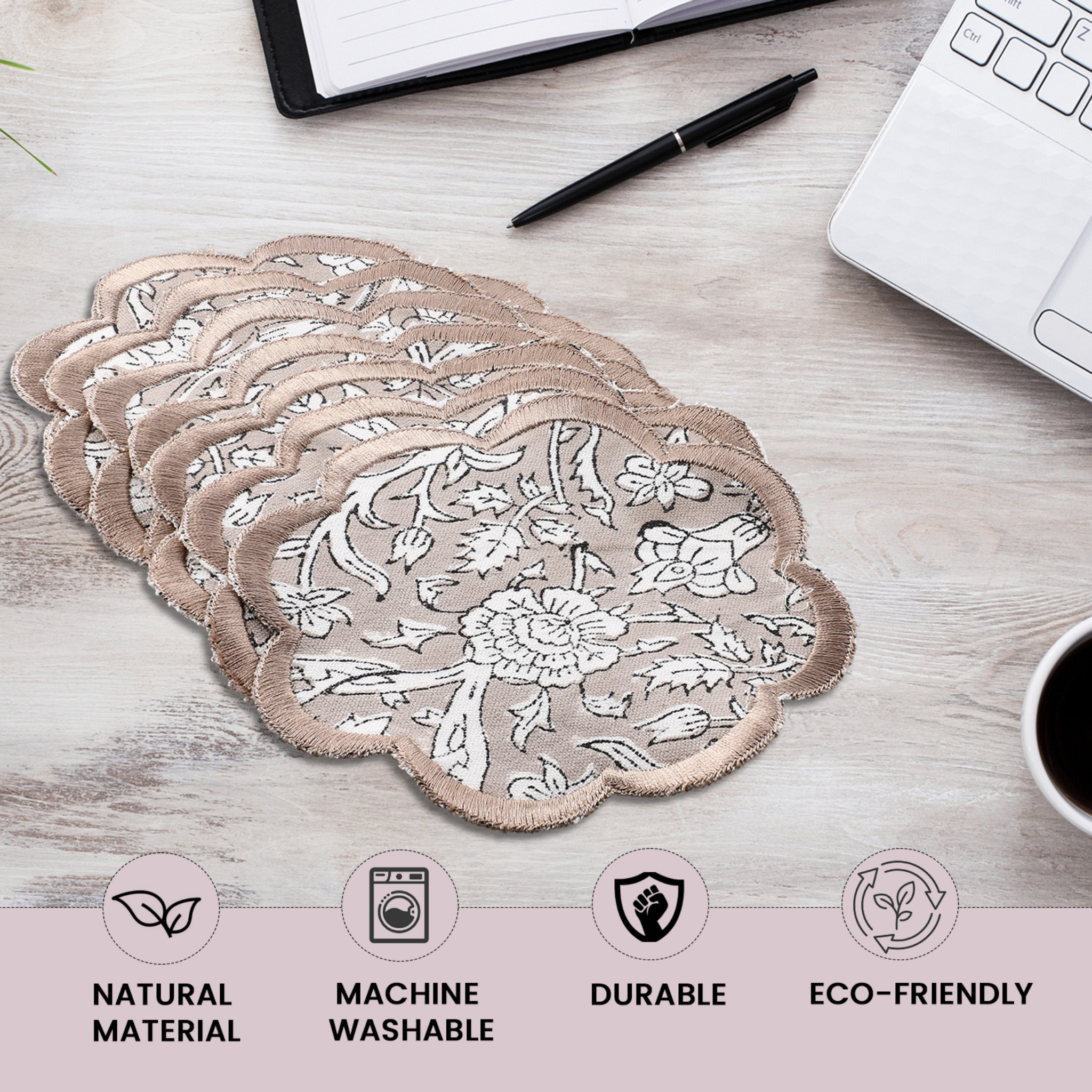 Set of floral lace coasters on a wooden surface with lifestyle elements.