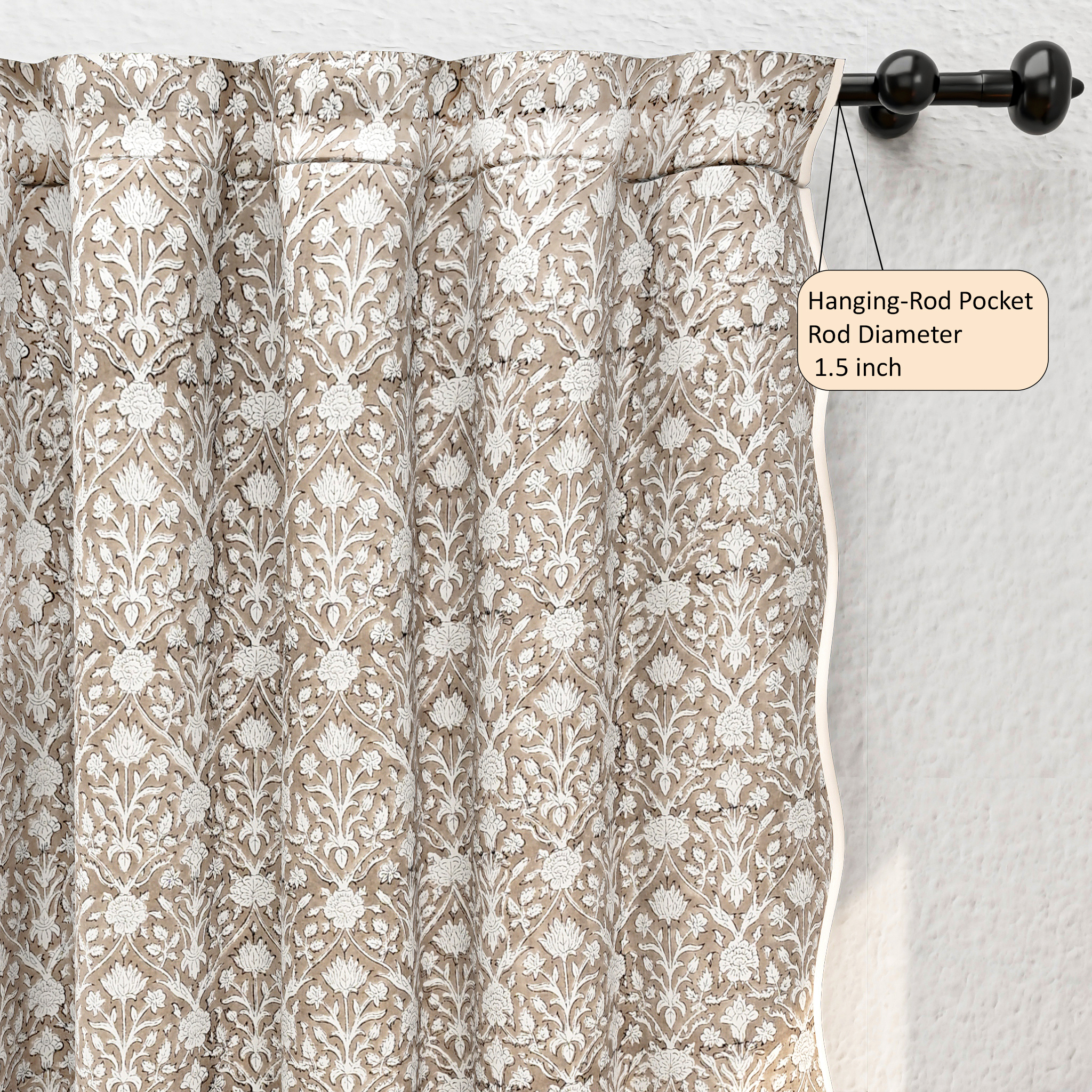 Patterned curtain with hanging-rod pocket on a white wall