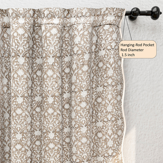 Patterned curtain with hanging-rod pocket on a white wall