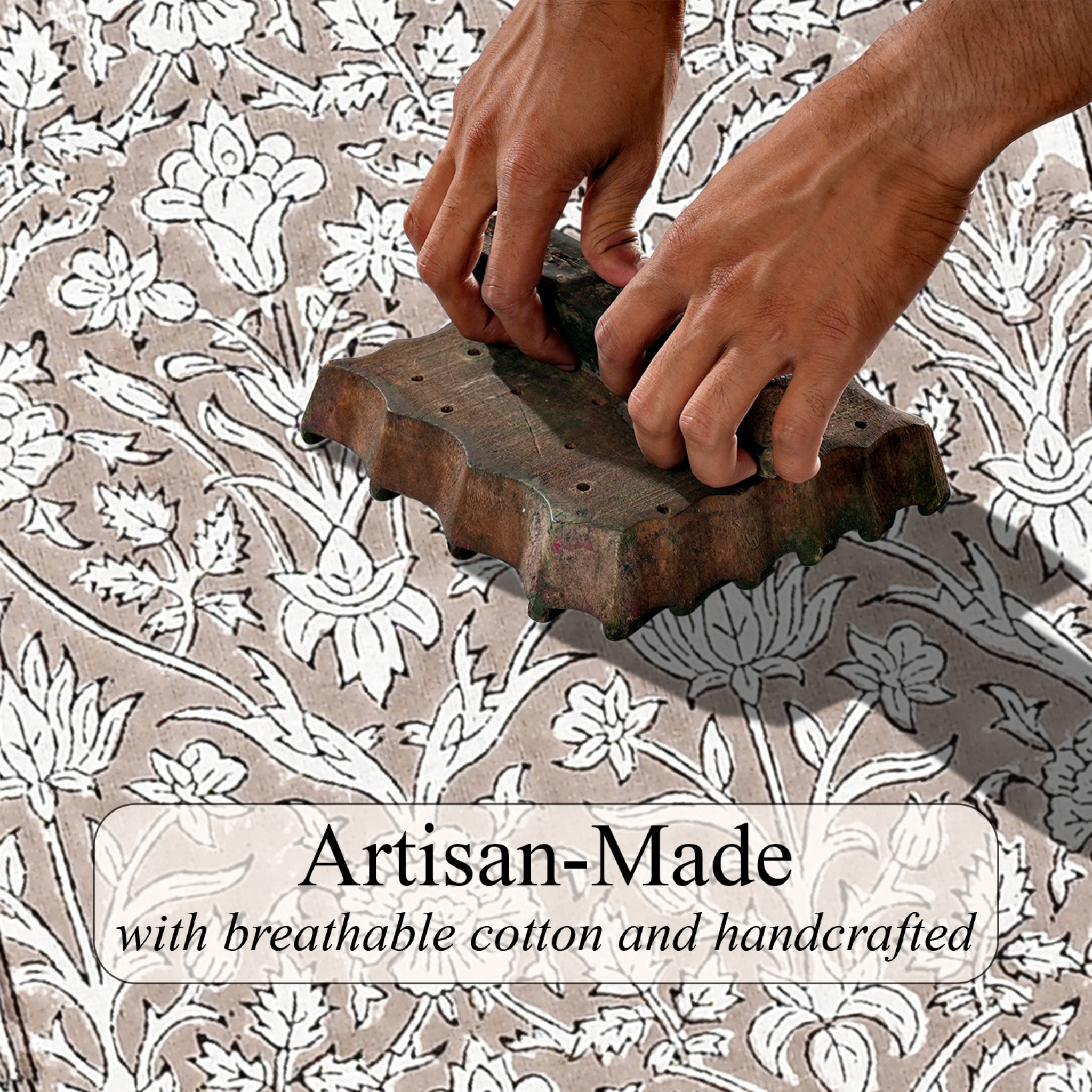 Hand using a wooden block to print a floral pattern on fabric with 'Artisan-Made' text overlay.