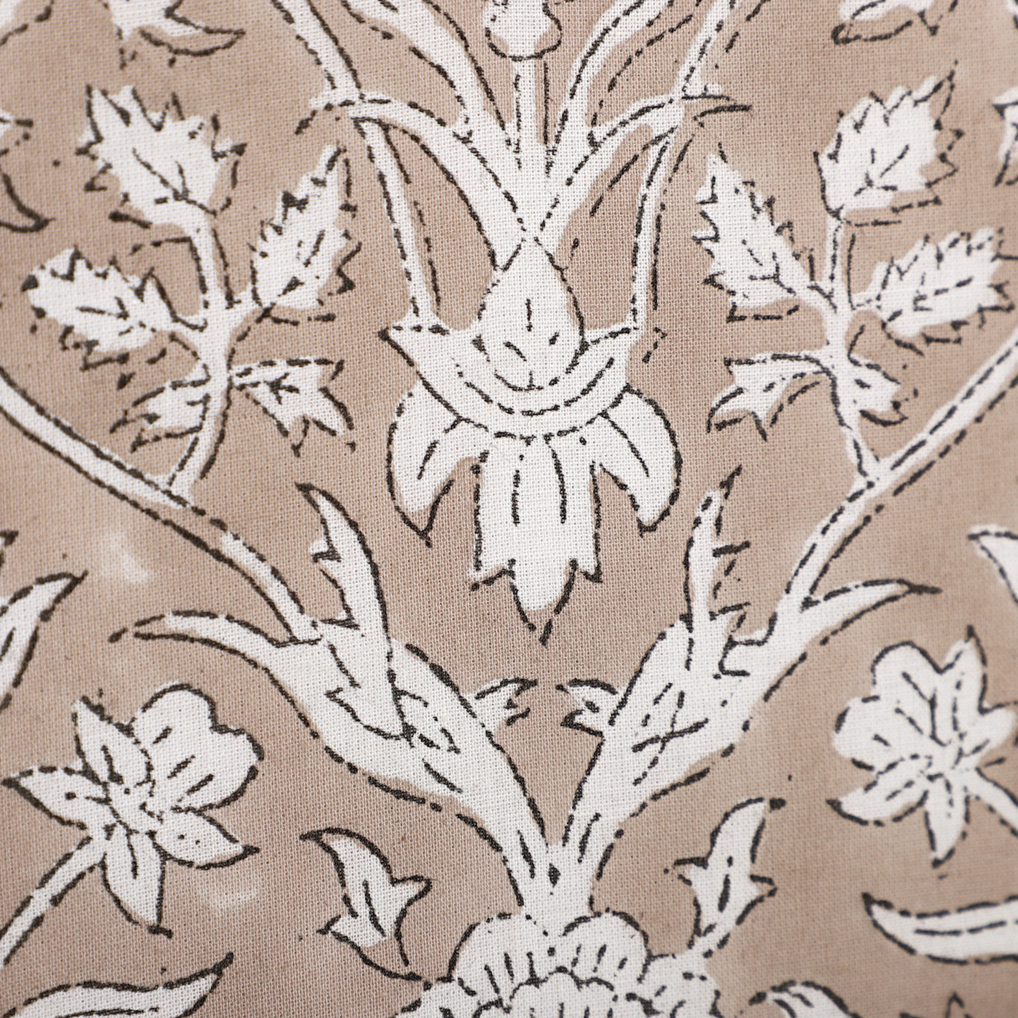 White floral pattern on a beige background