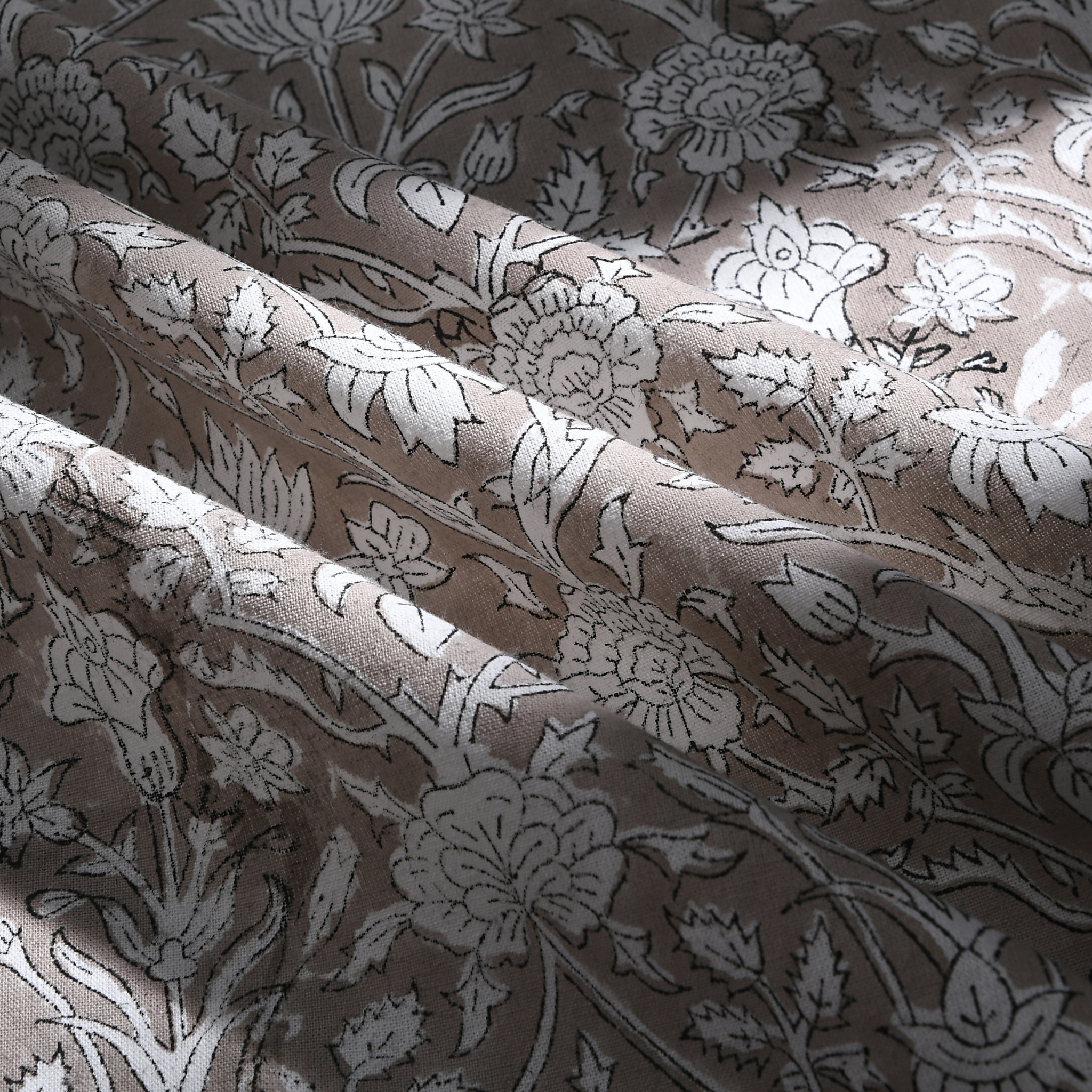 Floral patterned fabric with beige and gray colors