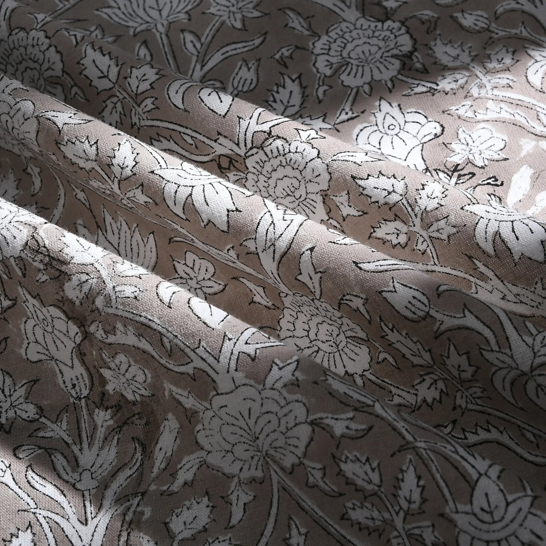 Floral patterned fabric with beige and gray colors