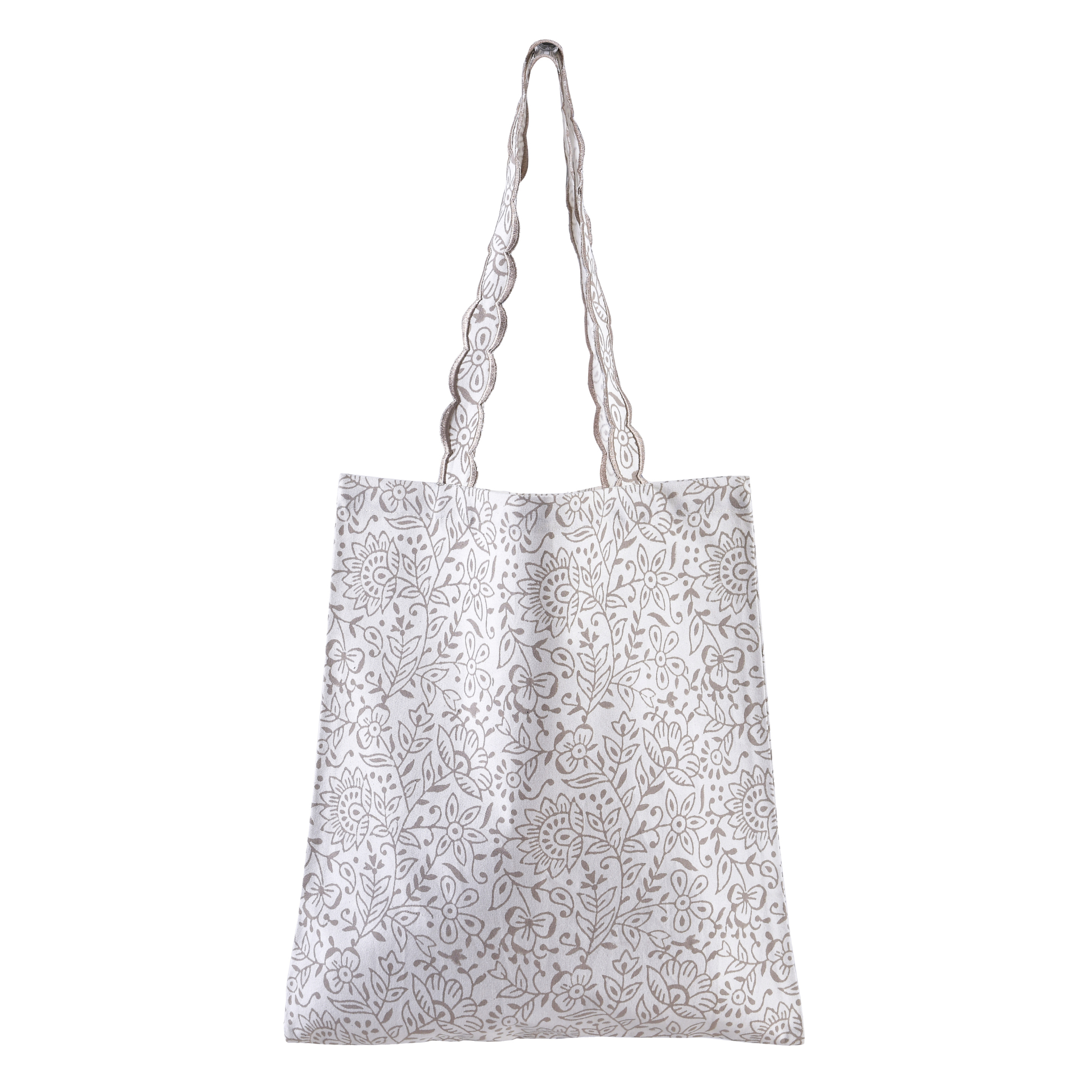 White tote bag with black floral pattern on a white background