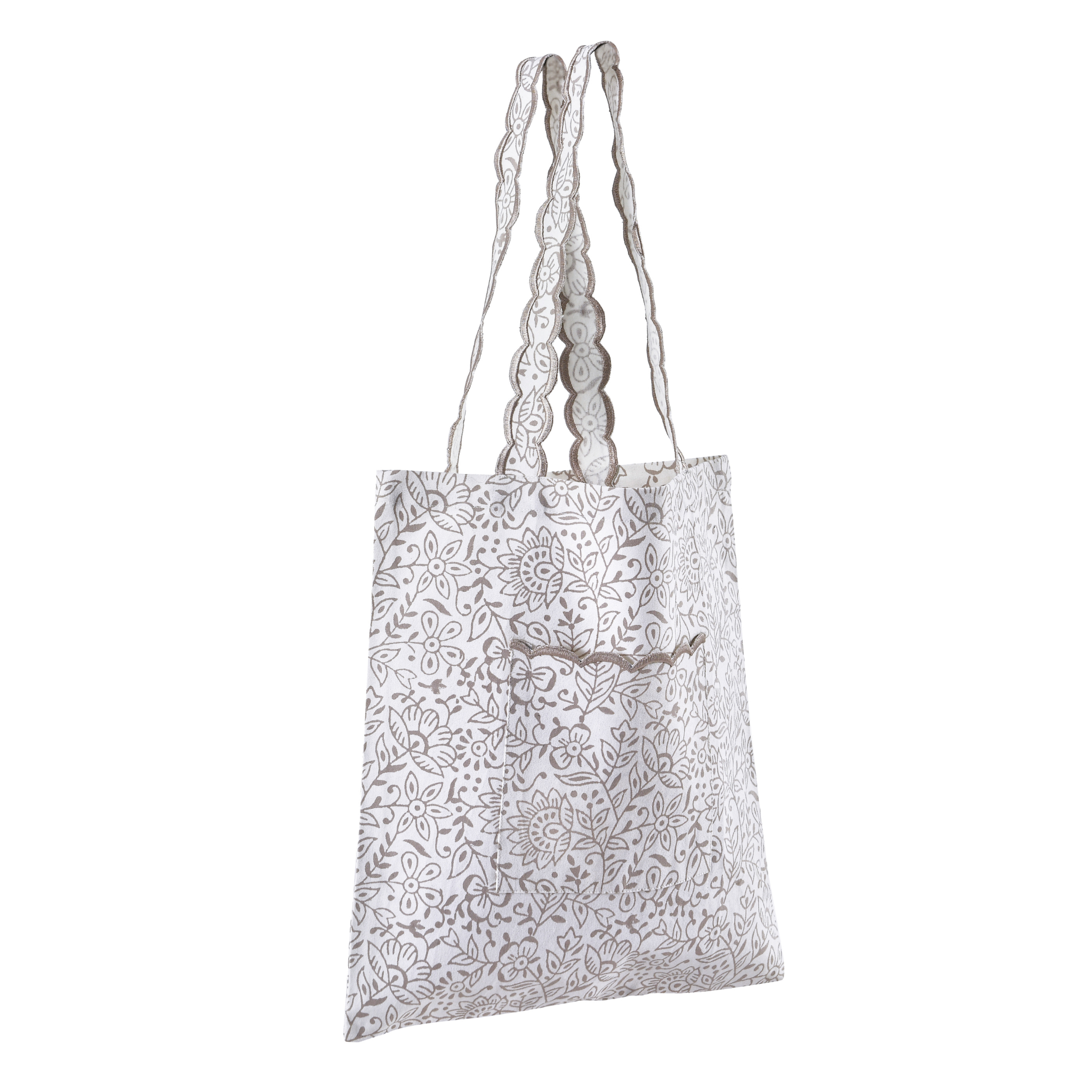 White tote bag with black floral pattern on a white background