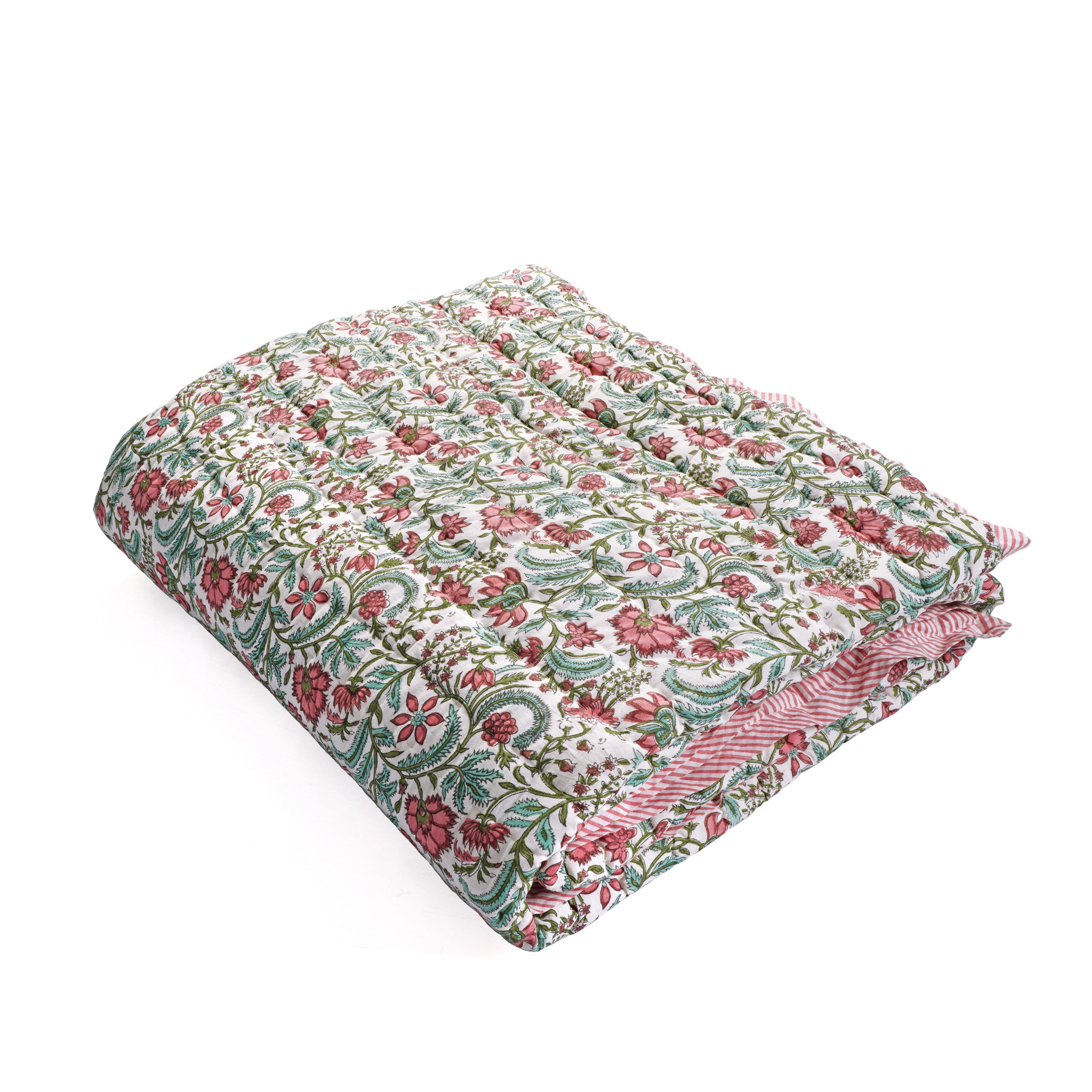 Floral patterned quilt on a white background