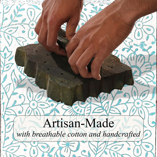 Hands using a textured green object with a floral patterned background and text 'Artisan-Made with breathable cotton and handcrafted'.