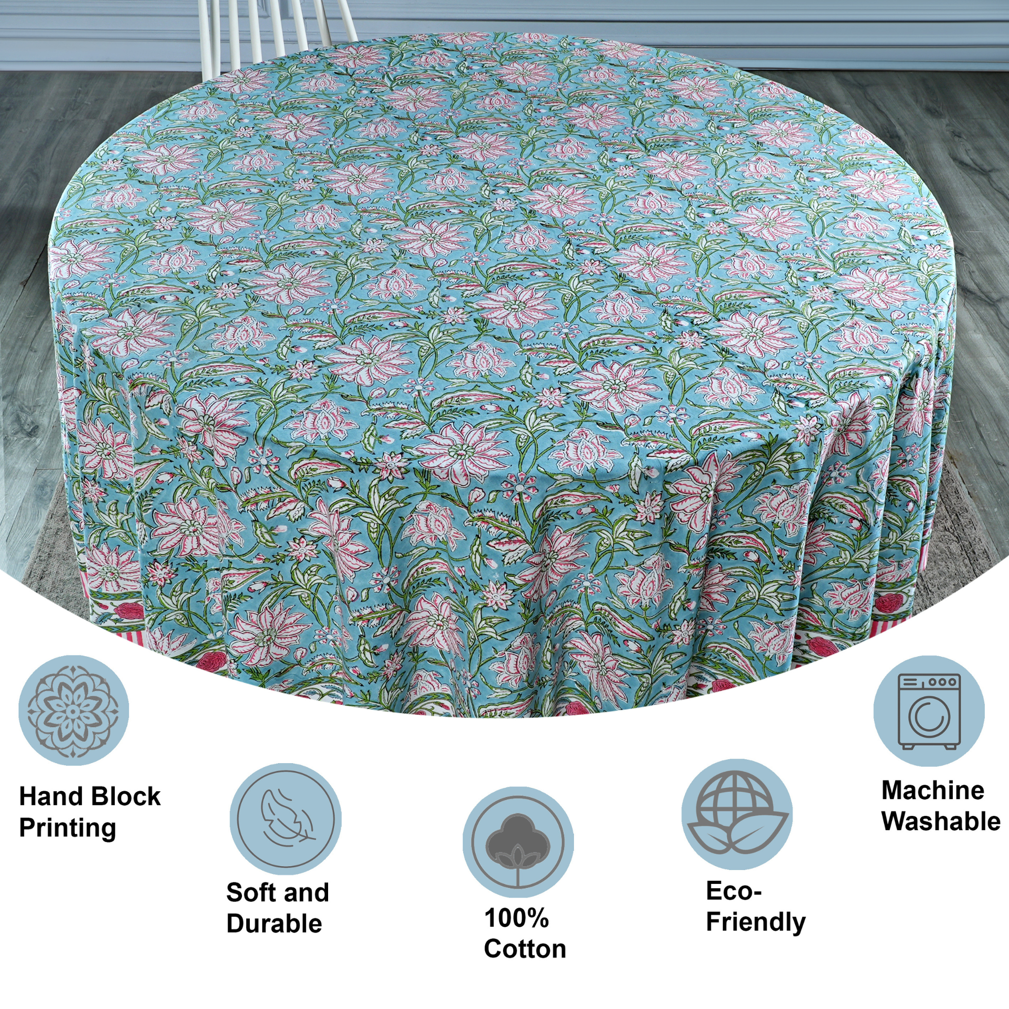 Floral patterned tablecloth on a round table with product features displayed below.