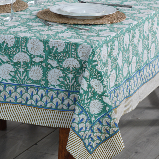 Tablecloth with floral pattern on a wooden table