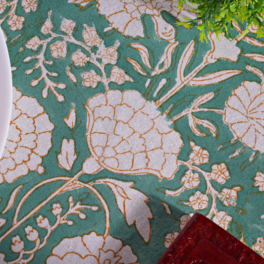 Floral patterned fabric with green background