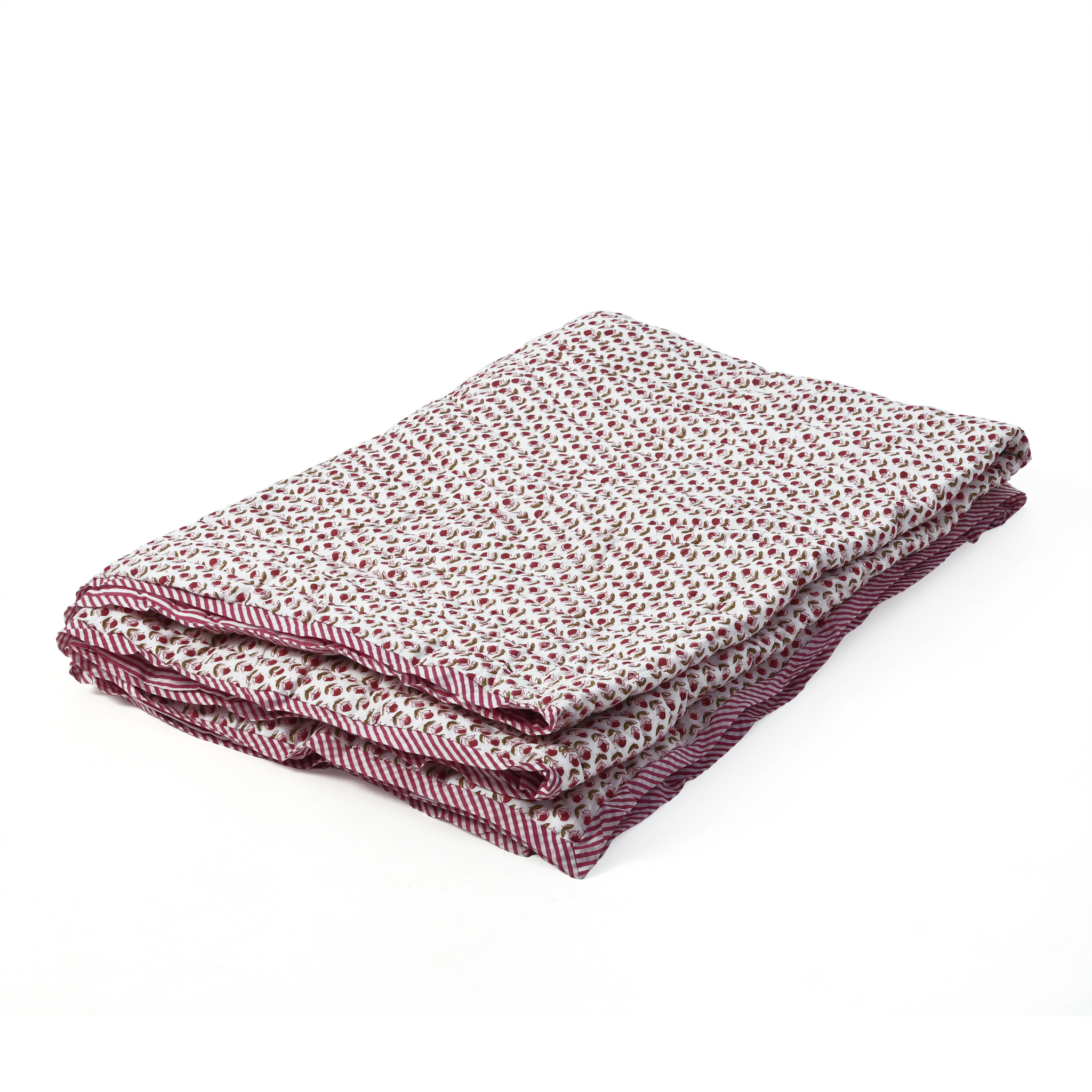 Folded fabric with a subtle pattern on a white background