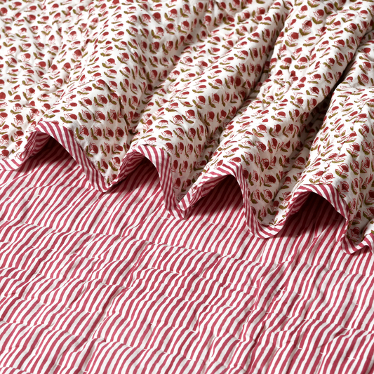 Red and white striped fabric with a floral pattern on top