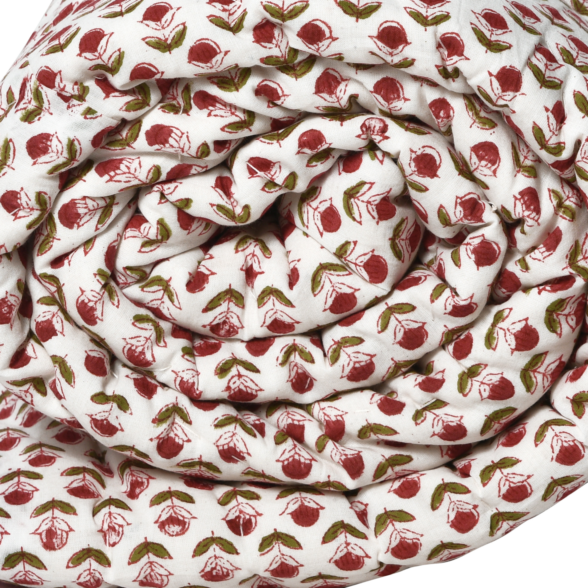 Close-up of fabric with red and green pattern on white background