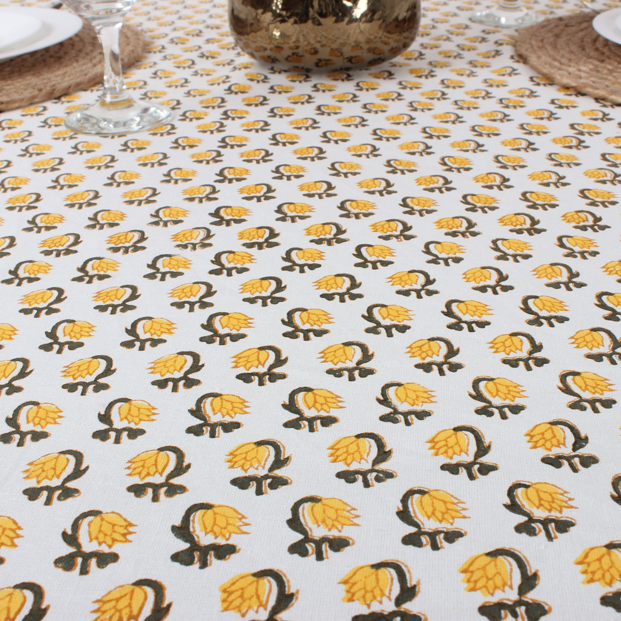 Tablecloth with sunflower pattern on a dining table setting
