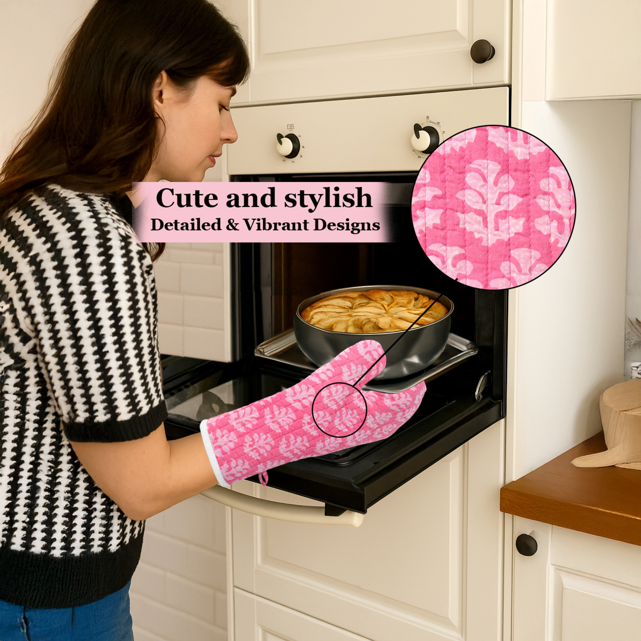 Woman wearing a pink oven mitt with floral pattern, opening an oven door.