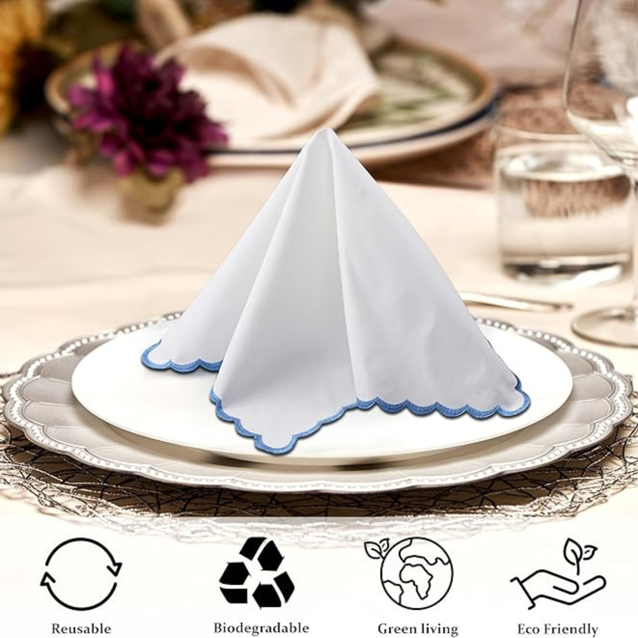 White folded napkin on a decorative plate with eco-friendly icons below.