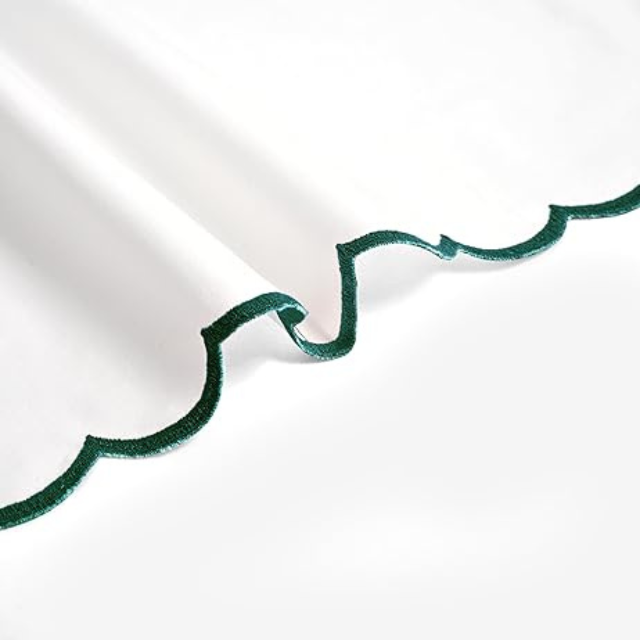 Green decorative trim on a white background