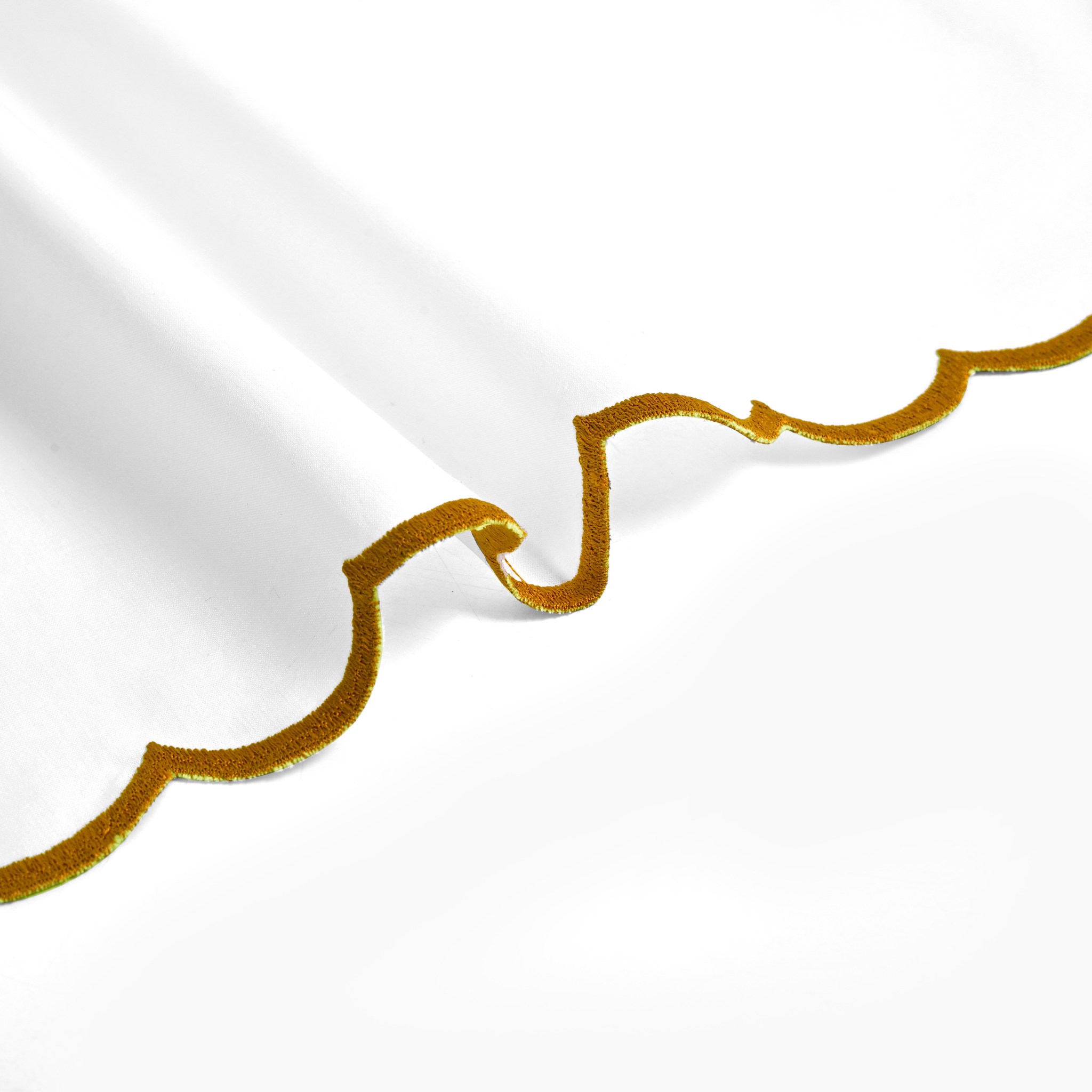 Gold decorative trim on a white background