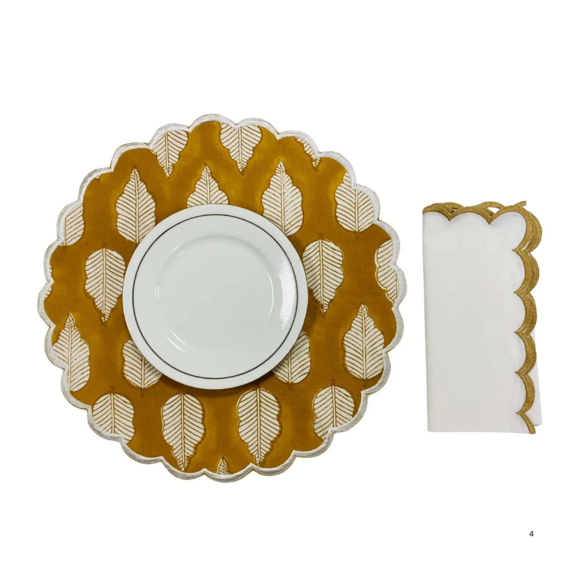 Placemat with leaf pattern and white bowl on a white background